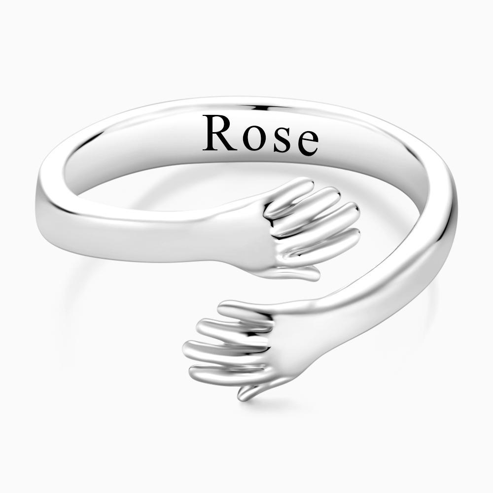 Hug Ring – Engraved Hands Design
