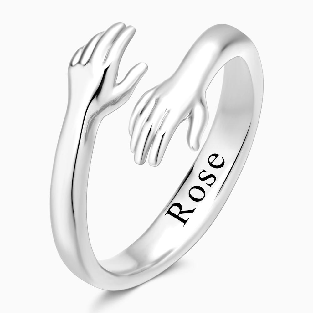 Hug Ring – Engraved Hands Design
